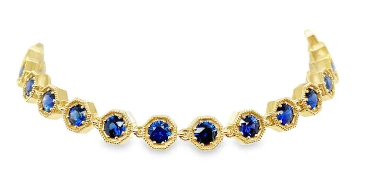 Blue Sapphire and 18k Yellow Gold Tennis Bracelet, 4.96 Carats Total, 7 Inches