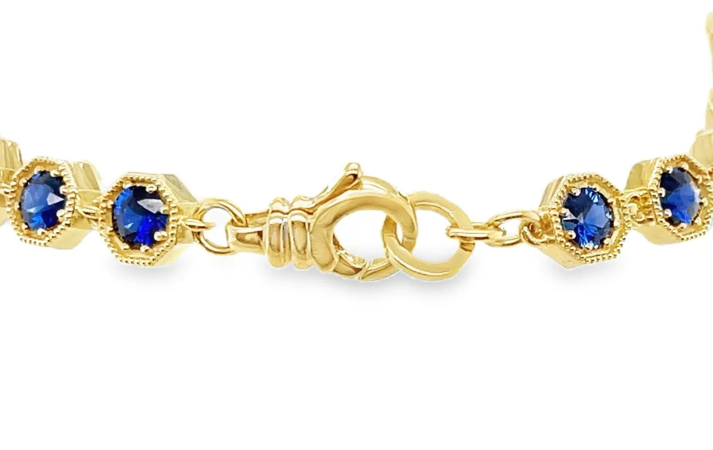 Blue Sapphire and 18k Yellow Gold Tennis Bracelet, 4.96 Carats Total, 7 Inches