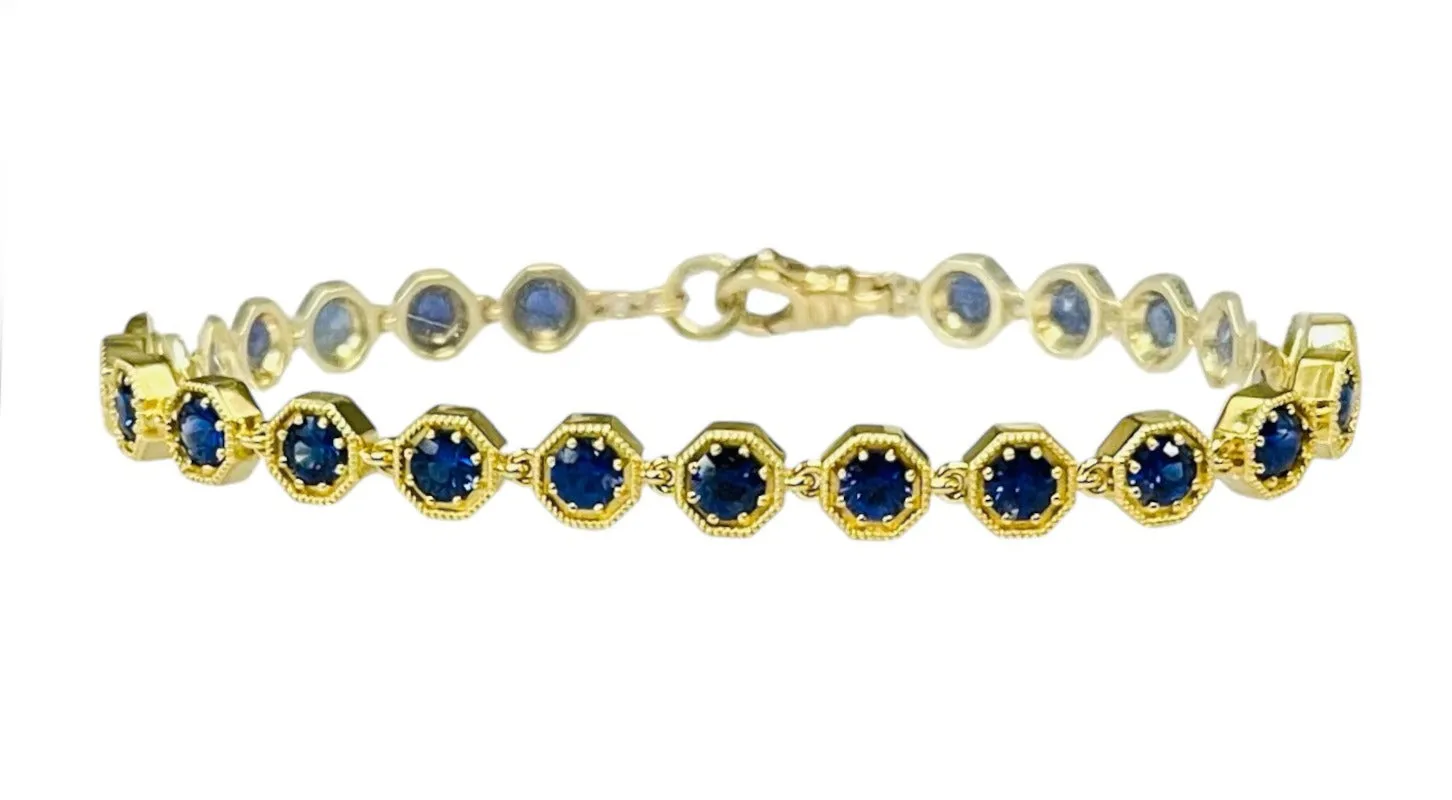 Blue Sapphire and 18k Yellow Gold Tennis Bracelet, 4.96 Carats Total, 7 Inches