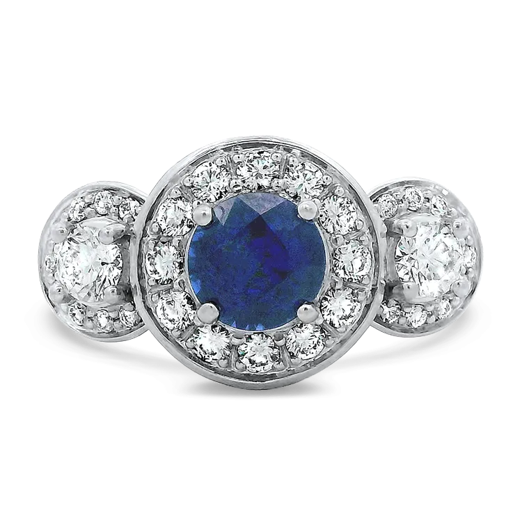 Estate Platinum Sapphire and Diamond Halo Ring