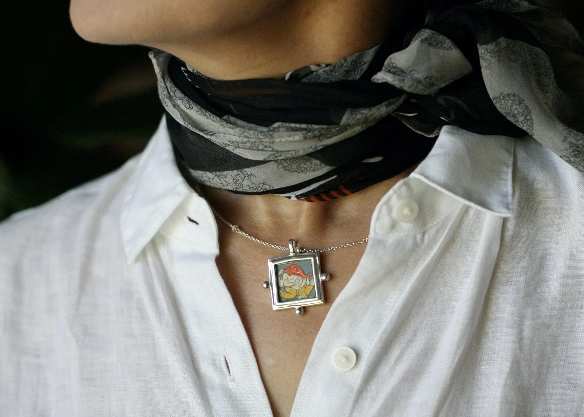 Ganesha miniature painting pendant on a floating pearl chain