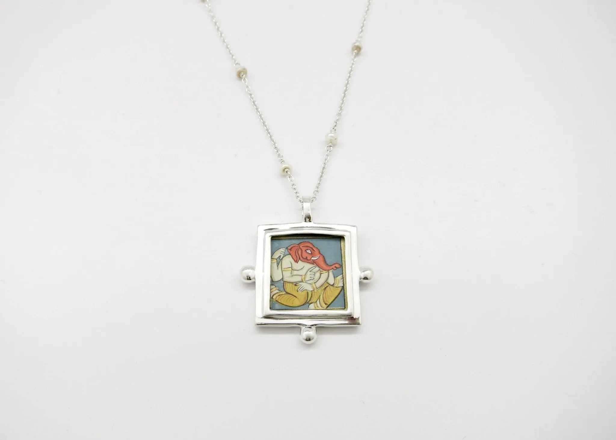 Ganesha miniature painting pendant on a floating pearl chain