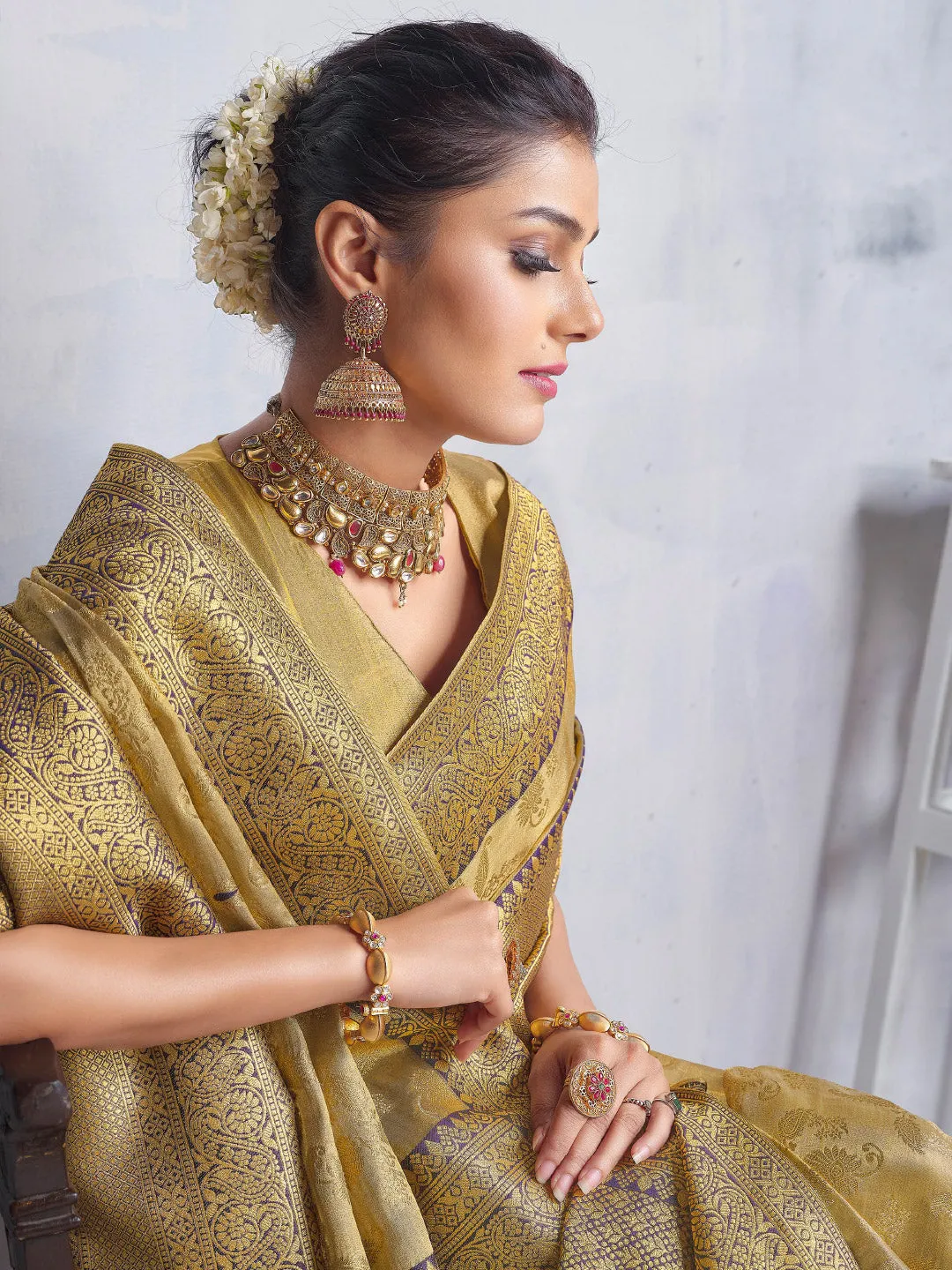 Luxurious Matte Gold Tissue Saree Contrasted with Black Finish