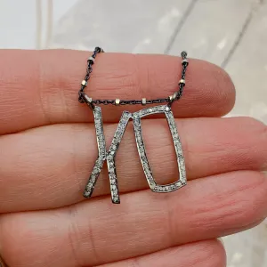 Pavé Diamond XO Necklace – Timeless Sparkle with Deep Meaning