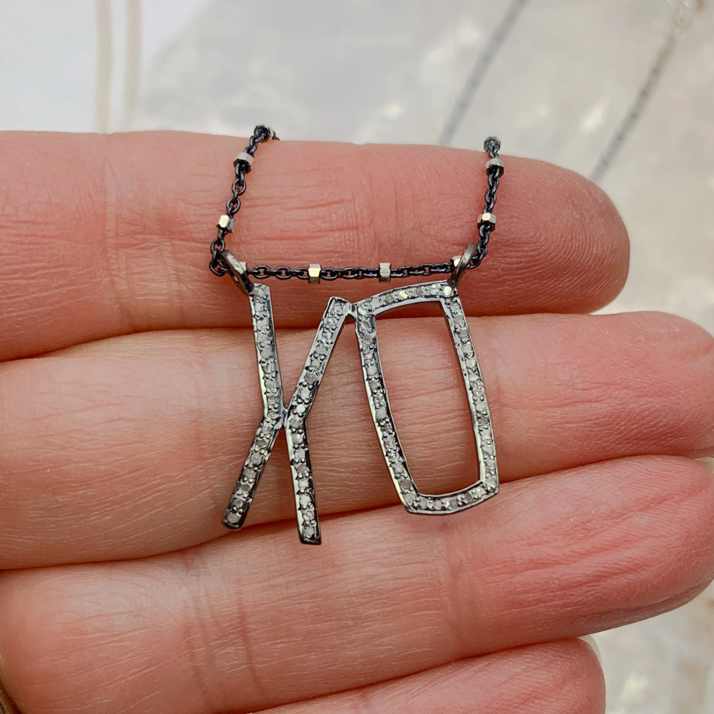 Pavé Diamond XO Necklace – Timeless Sparkle with Deep Meaning