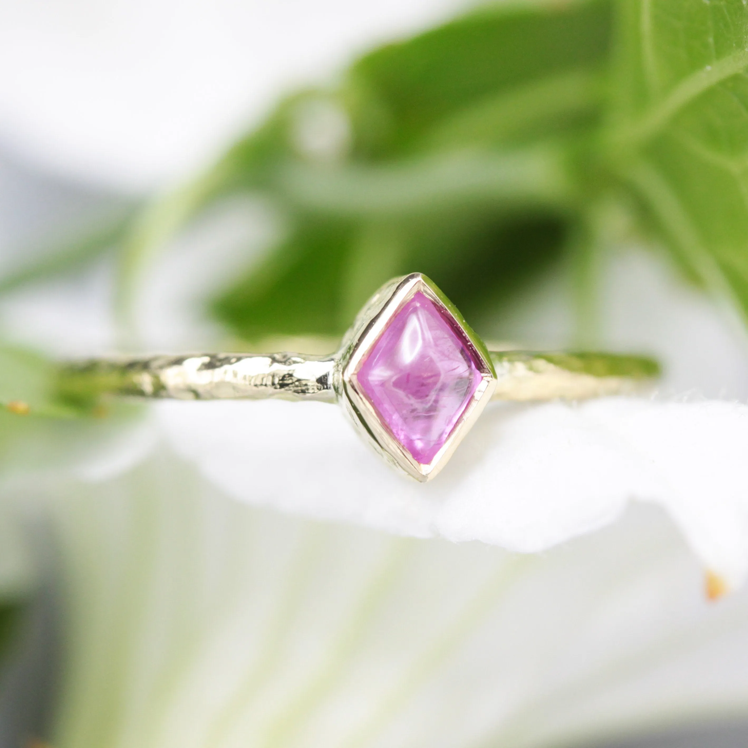 Rhombus pink sapphire ring in bezel setting with 18k gold texture band