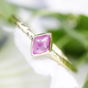 Rhombus pink sapphire ring in bezel setting with 18k gold texture band