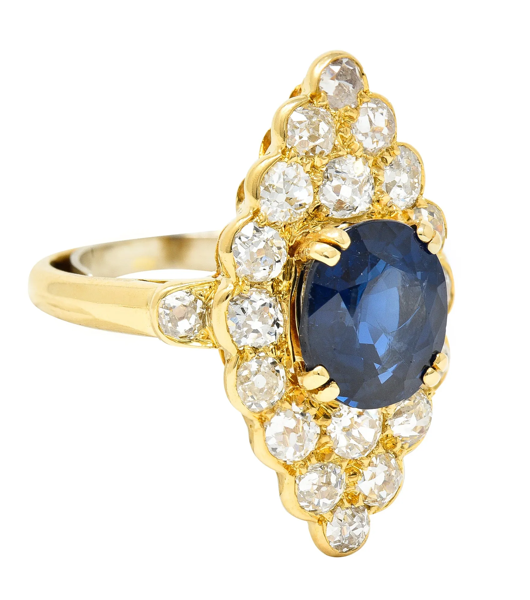 Substantial Chaumet Paris Mid-Century 6.35 CTW No Heat Sapphire Old Mine Cut Diamond 18 Karat Yellow Gold Vintage Navette Cluster Ring GIA