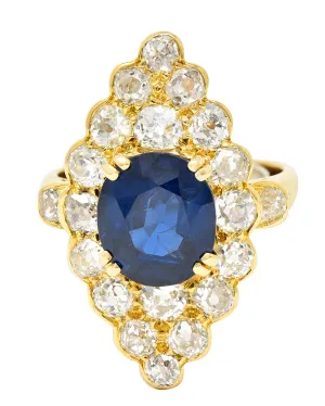 Substantial Chaumet Paris Mid-Century 6.35 CTW No Heat Sapphire Old Mine Cut Diamond 18 Karat Yellow Gold Vintage Navette Cluster Ring GIA