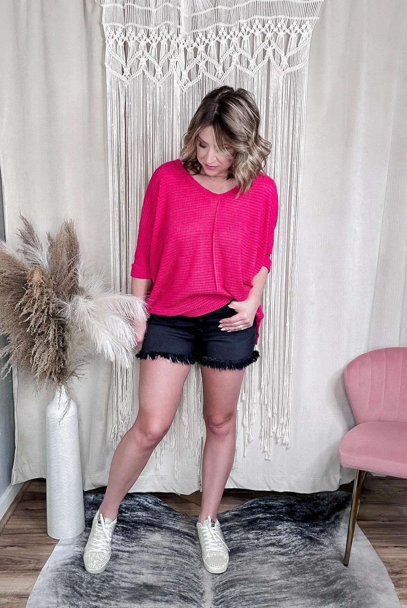 Tracey mid-rise raw hem black wash shorts