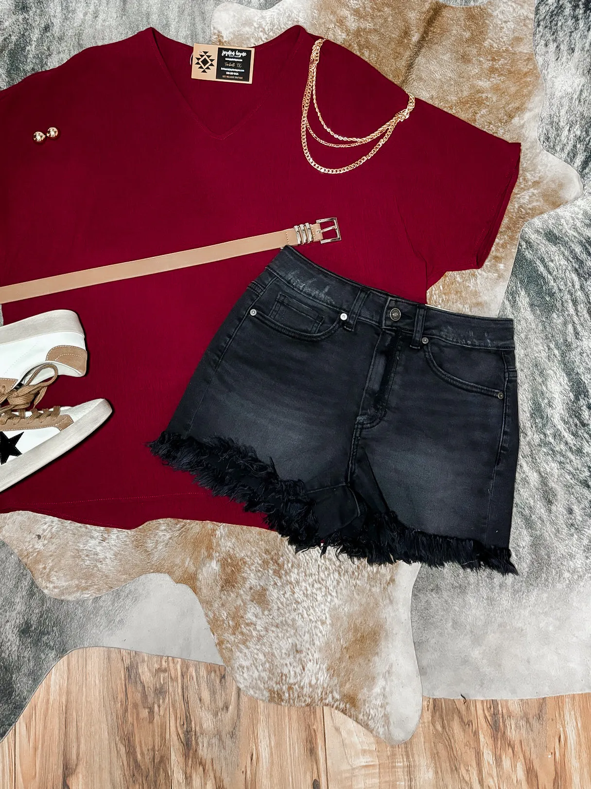 Tracey mid-rise raw hem black wash shorts