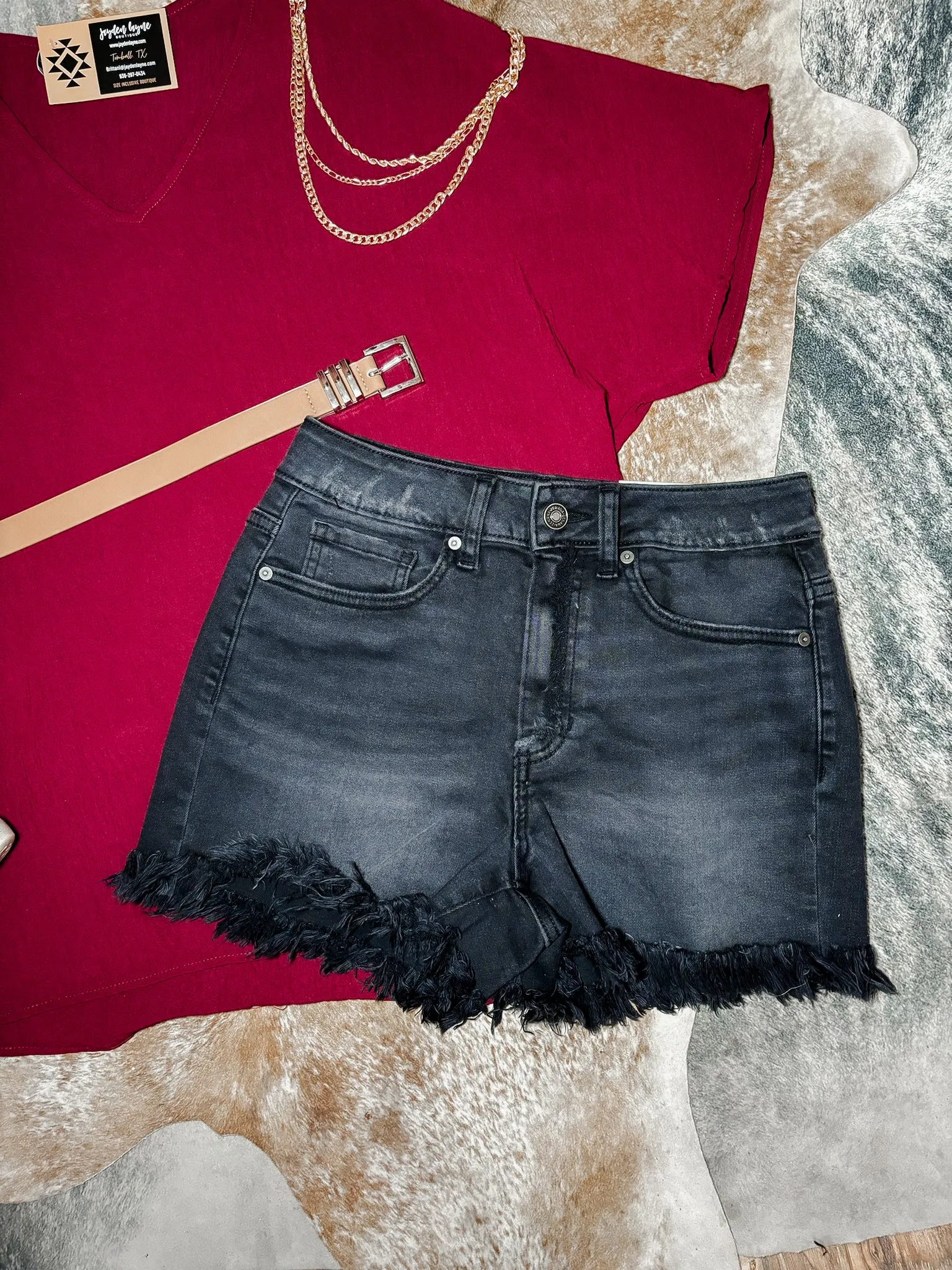 Tracey mid-rise raw hem black wash shorts